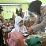 Polresta Malang Kota Gelar Program Peduli Gizi, Bagikan Makanan ke Sekolah-sekolah